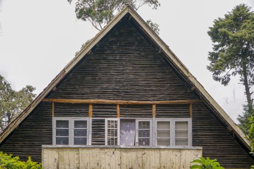 Free Rustic A-frame cabin surrounded by greenery in Pangalengan, West Java, Indonesia. Stock Photo