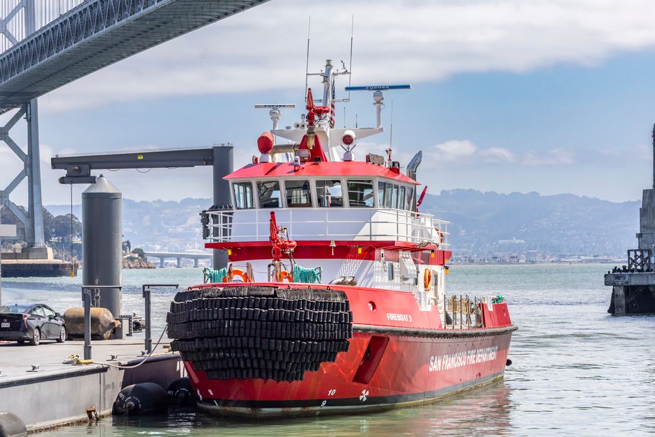 Wreckage of a boat being recovered from the bay