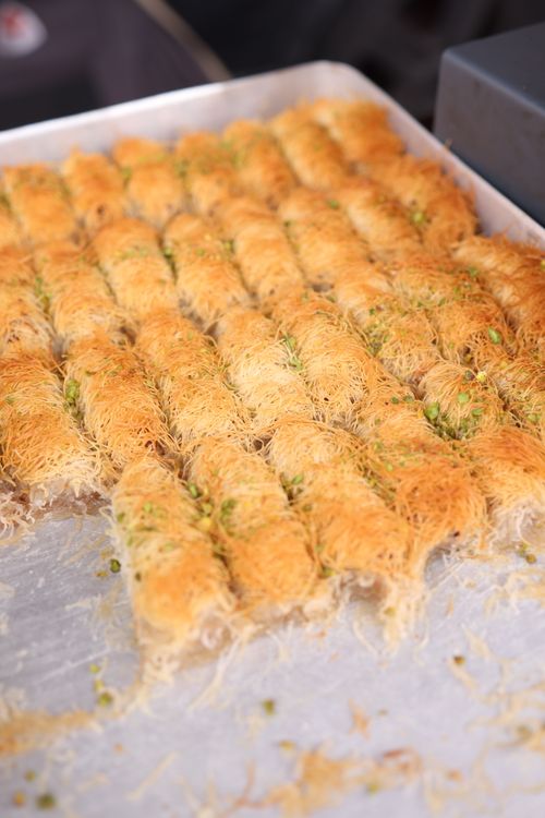 Free Close-up of freshly baked traditional baklava rolls with pistachios Stock Photo