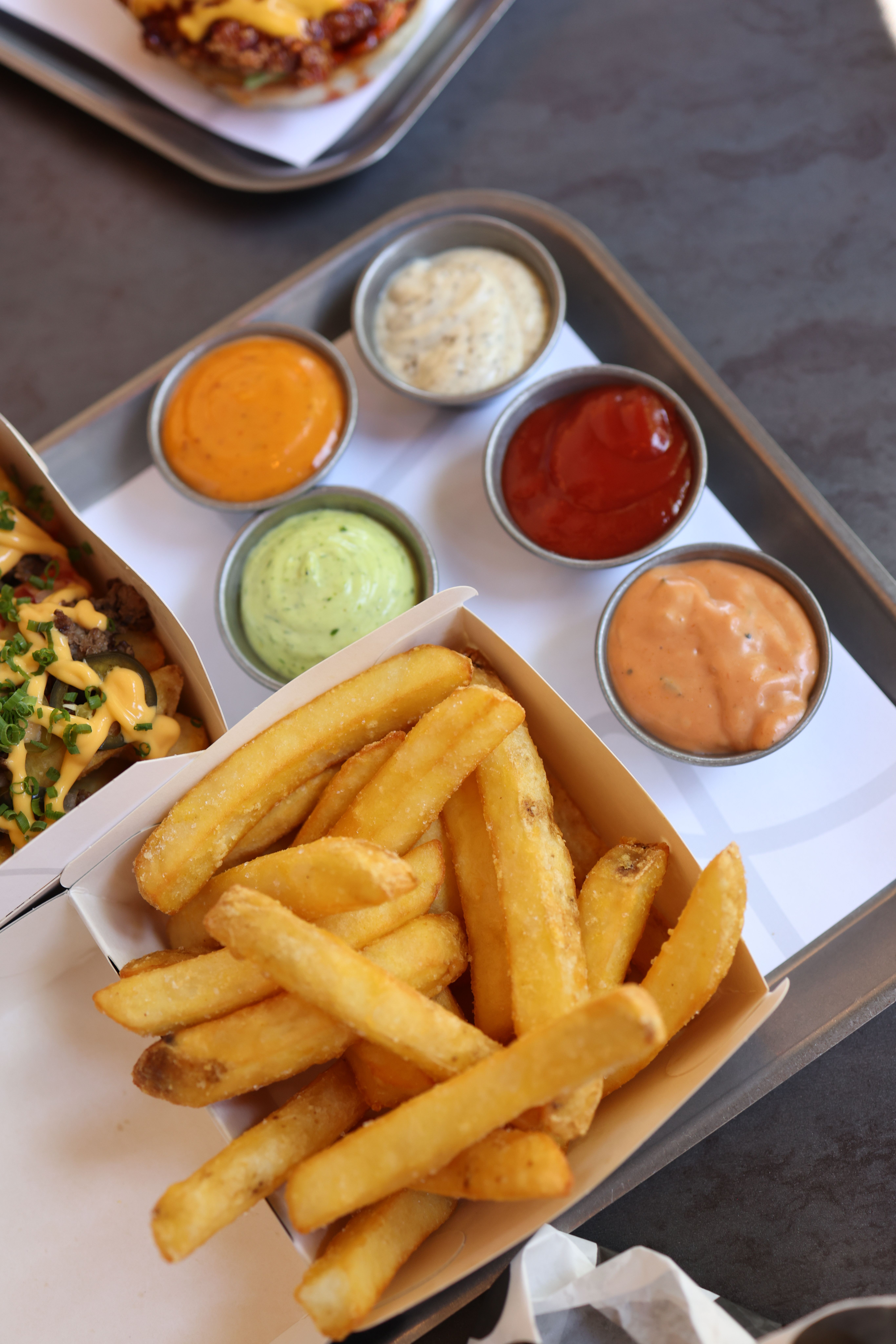 Delicious French Fries with Assorted Dips · Free Stock Photo