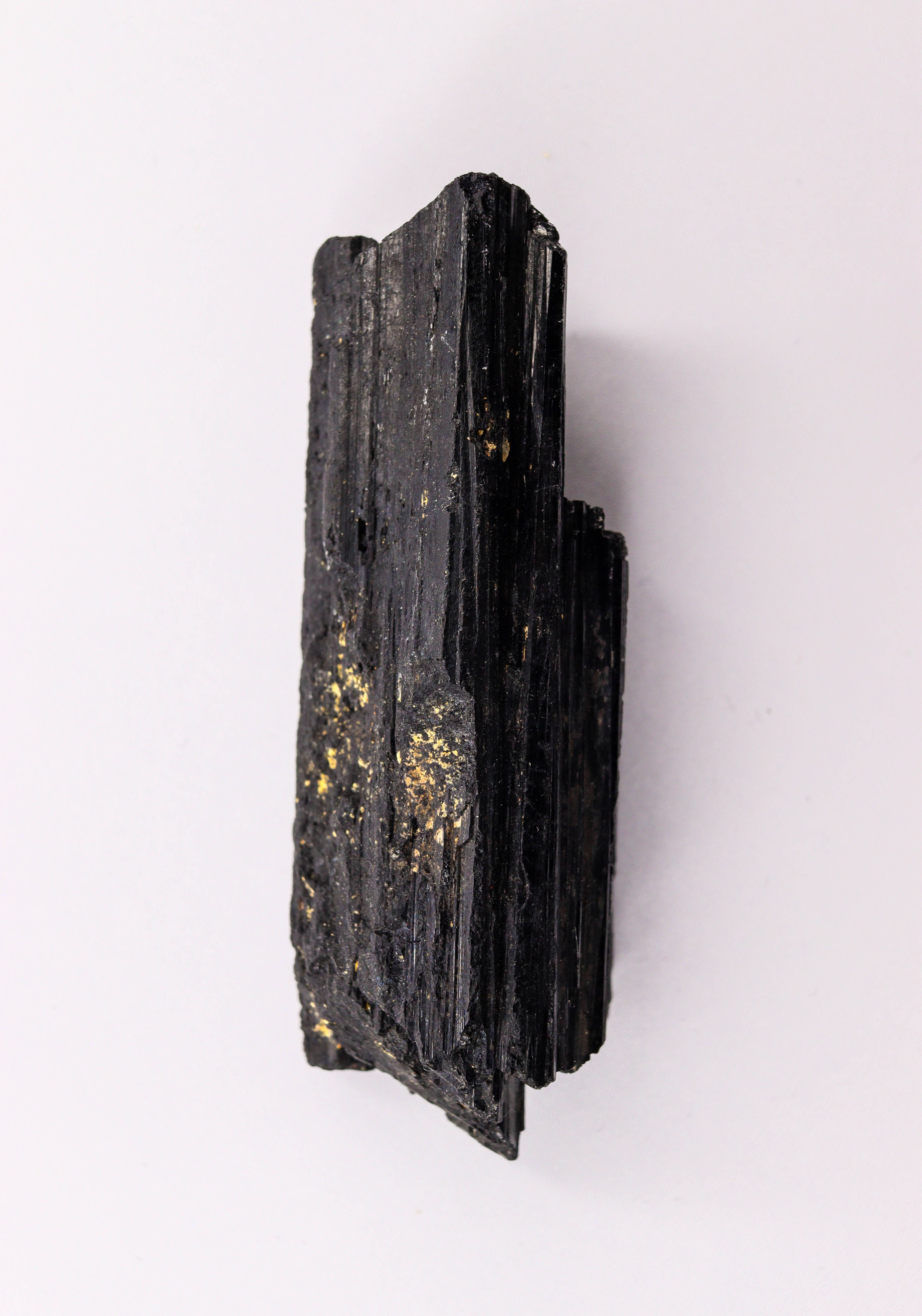 Raw black tourmaline specimen