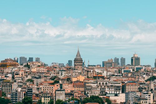 Free A scenic cityscape of Istanbul featuring the historic Galata Tower against a vibrant sky. Stock Photo
