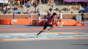 An athlete sprinting on a track -- photo by Chris L on Pexels