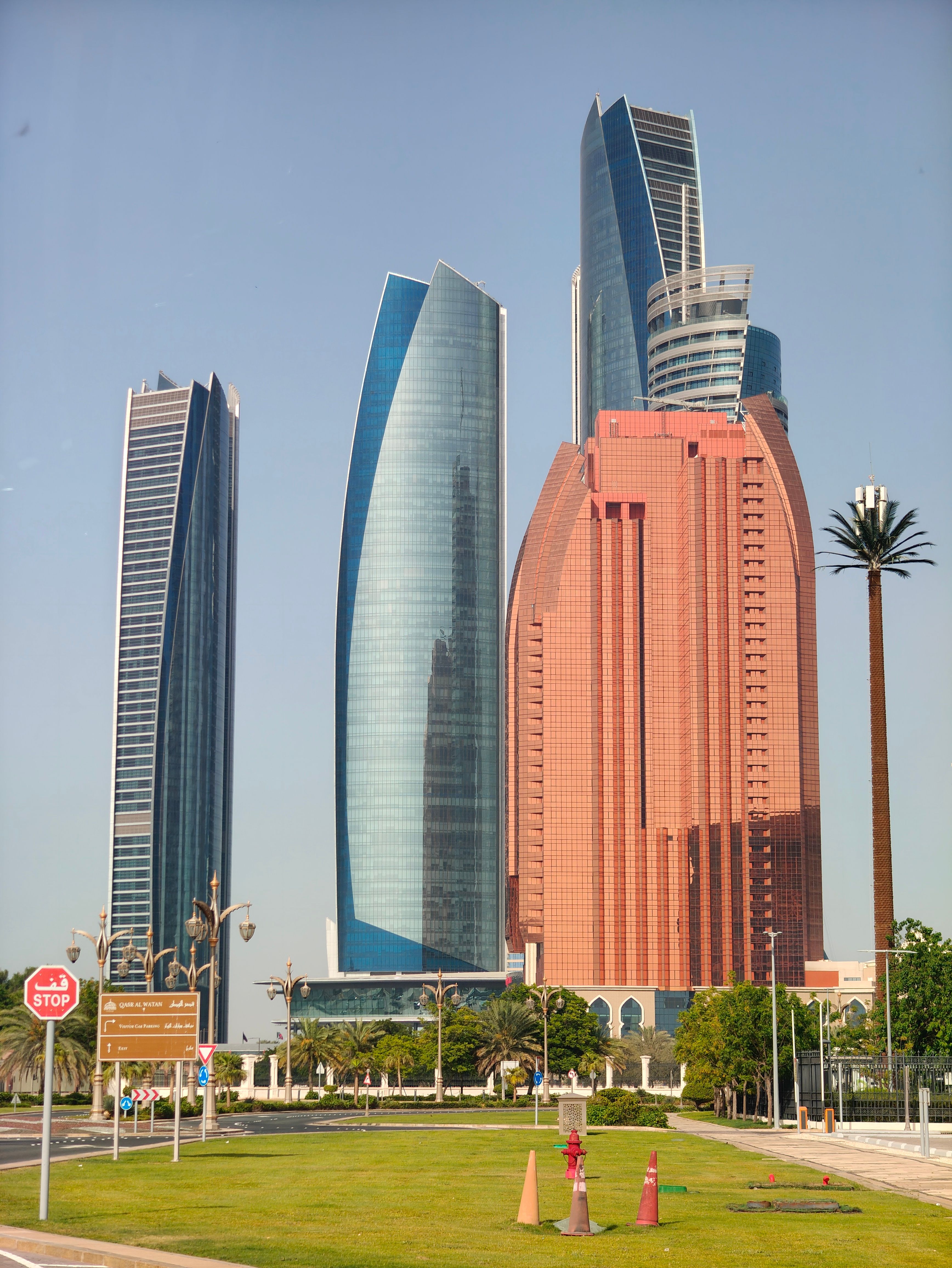 Etihad Towers soaring against the clear blue sky in Abu Dhabi, showcasing modern architecture.