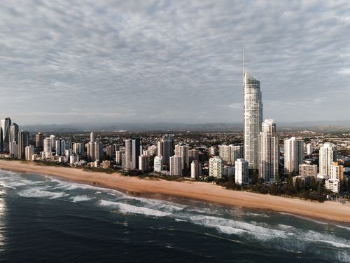 Free Stunning aerial view of Gold Coast skyline with beach and ocean waves. Stock Photo