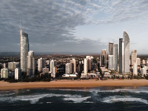Free Aerial view of Gold Coast skyline with beachfront and ocean. Stock Photo