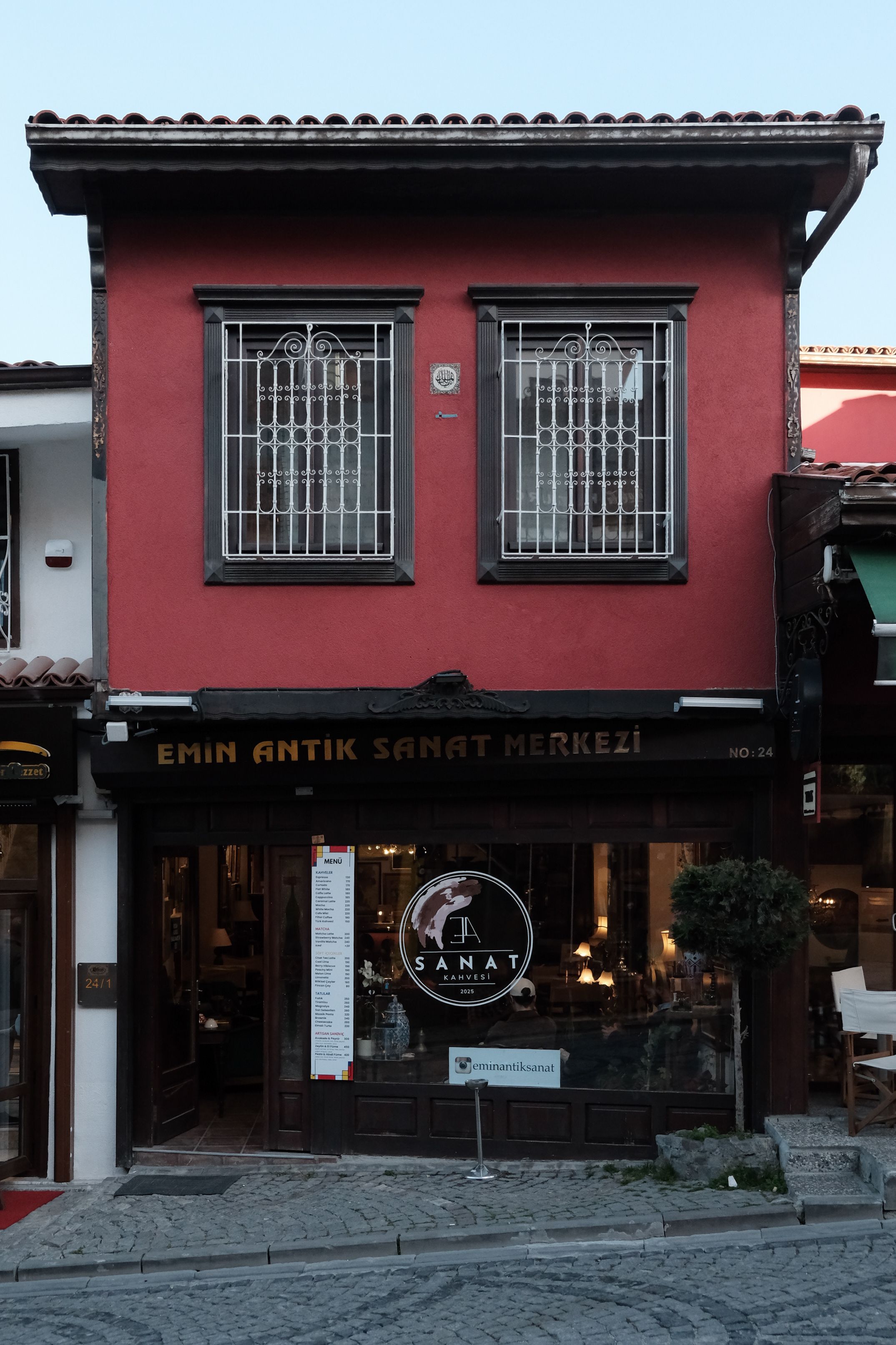 Historic facade of Emin Antik Sanat Merkezi displaying its vintage architecture.