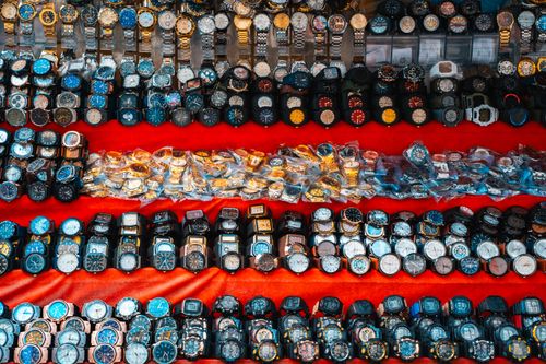 Free Colorful wristwatch display at a vibrant street market in Colombo, Sri Lanka. Stock Photo