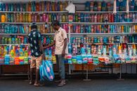Bright and colorful plasticware displayed at a street market in Colombo, Sri Lanka.