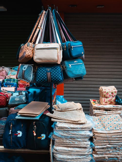 Free Colorful display of handbags and mats at a street market in Colombo, Sri Lanka. Stock Photo