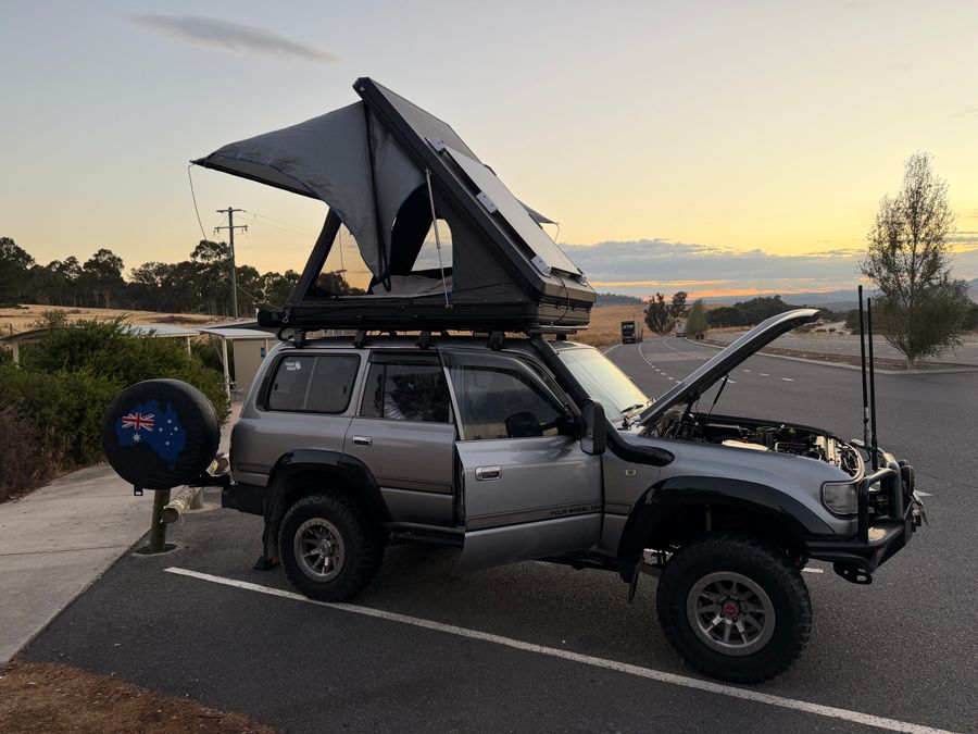 Illustrative large soft-shell rooftop tent campsite