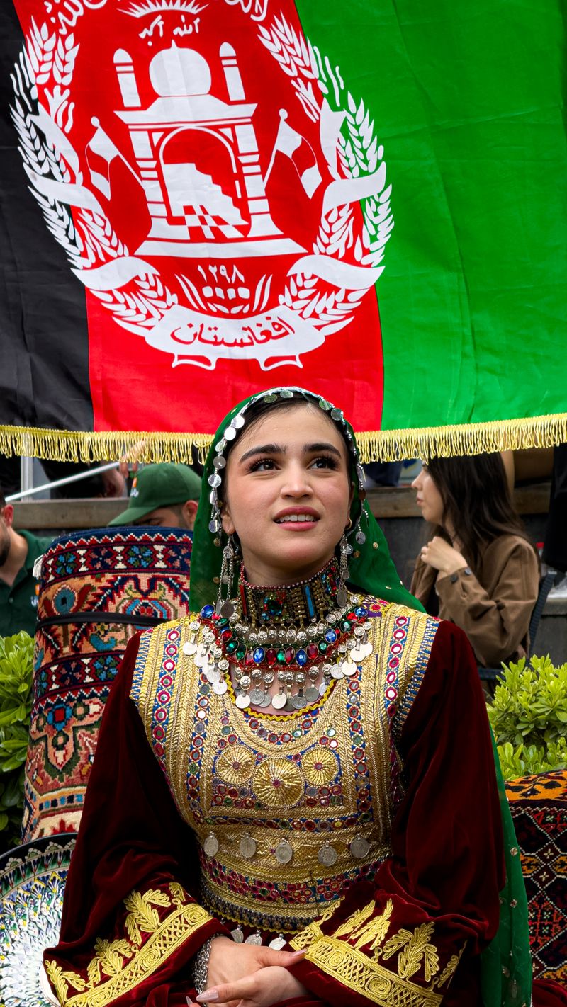 Afghan flag colors displayed at a patriotic celebration
