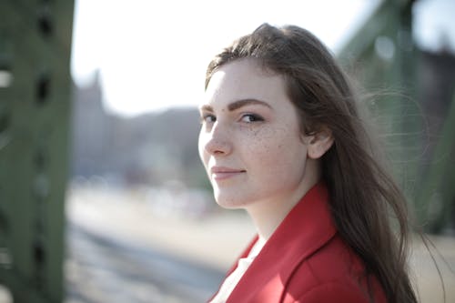 Portrait Photo of Woman in Red Top