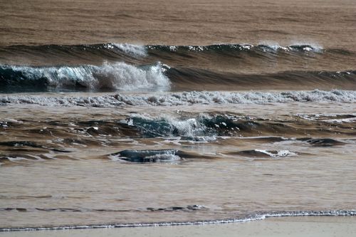 Free Dynamic ocean waves rolling on Guaratuba Beach, Paraná, capturing the serene coastal vibe. Stock Photo