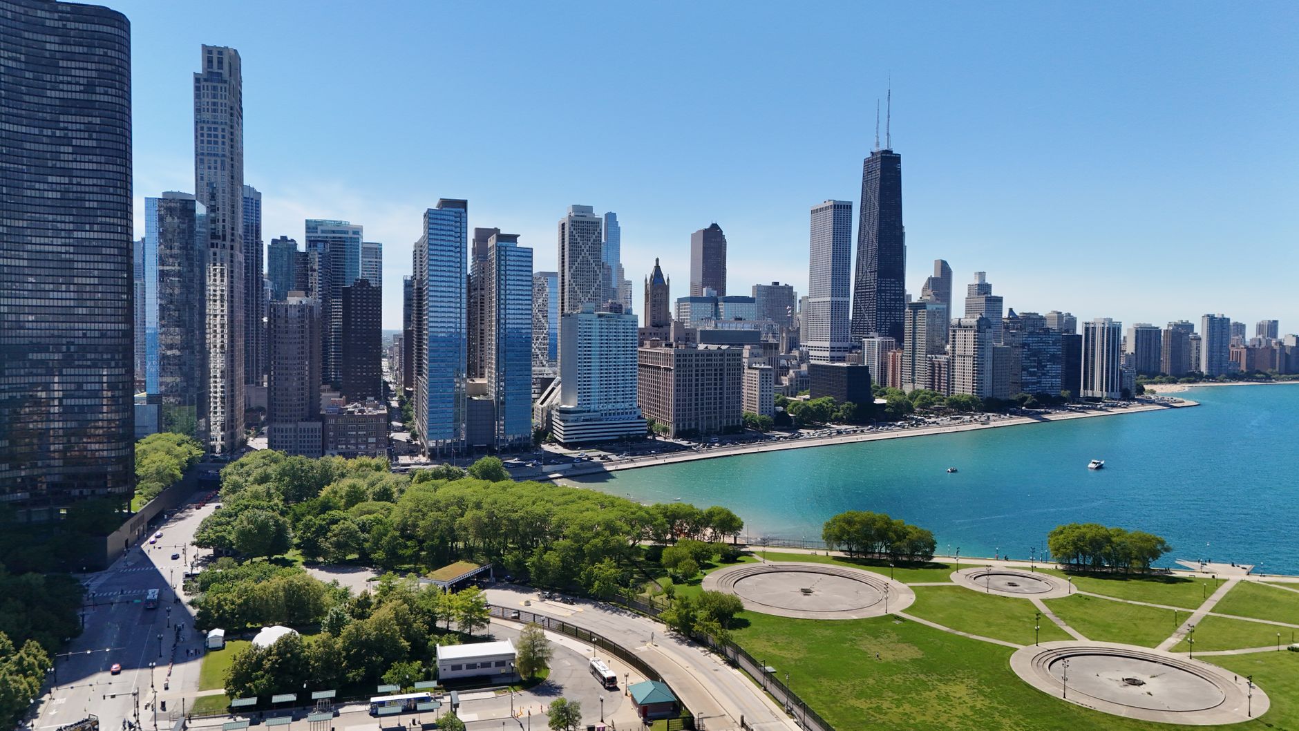 A breathtaking aerial shot of Chicago skyline with Lake Michigan on a clear day.