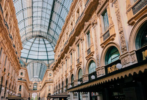 Majestic interior of Milan's Galleria Vittorio Emanuele II, an iconic shopping arcade.