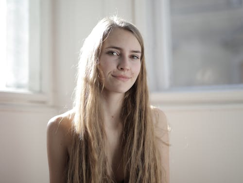 Shallow Focus Photo of Woman Smiling