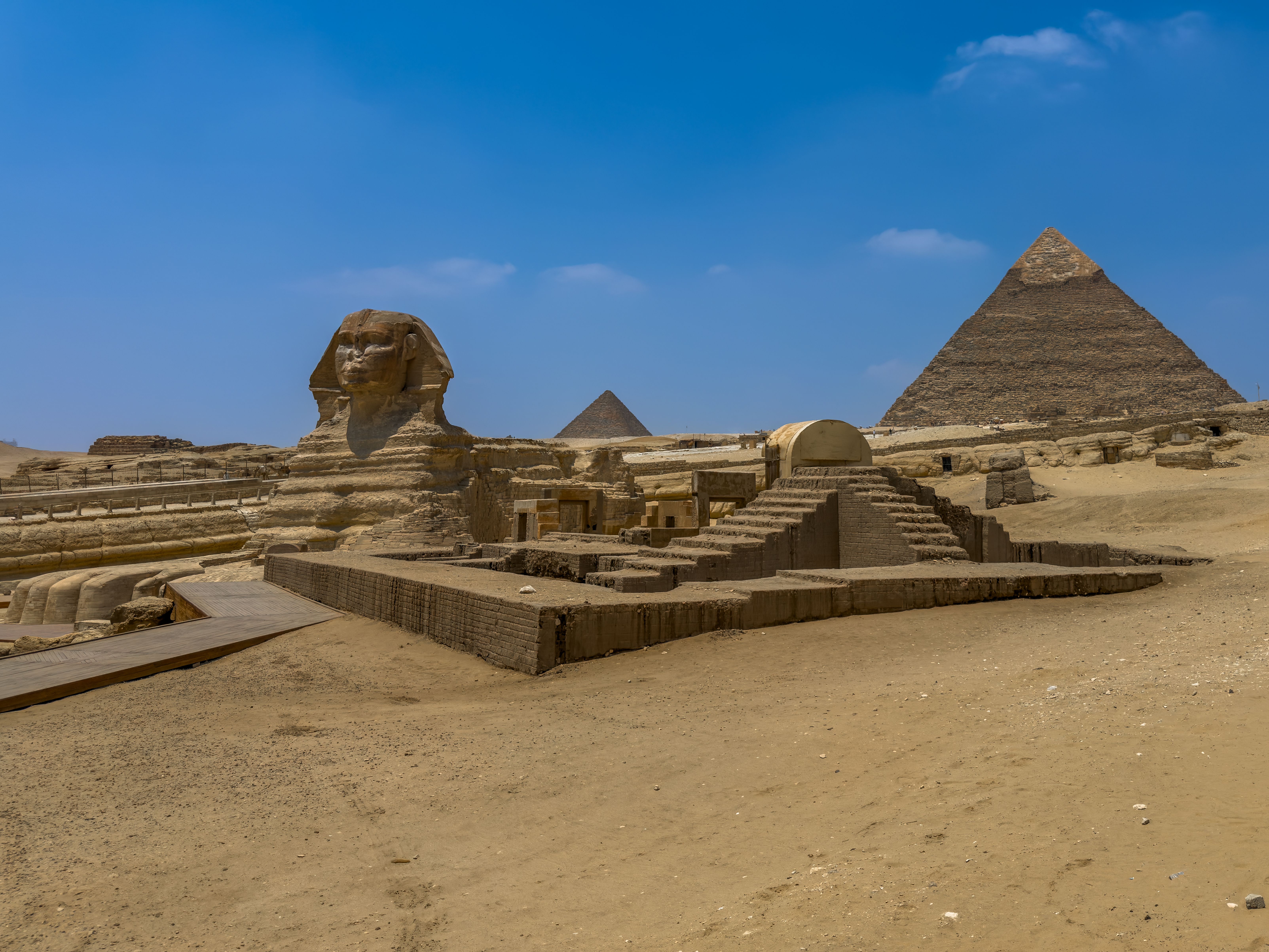 Hand-painted papyrus artwork depicting ancient Egyptian scenes