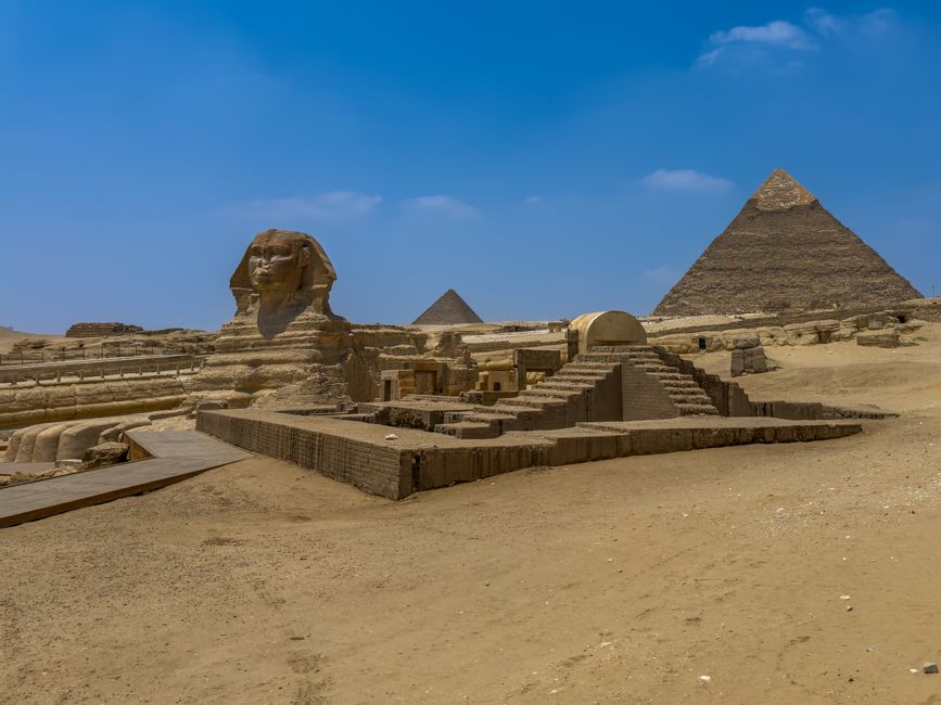 Hand-painted papyrus artwork depicting ancient Egyptian scenes