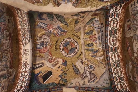 Close-up of vibrant Byzantine mosaics inside Chora Church, İstanbul, showcasing historical artistry.