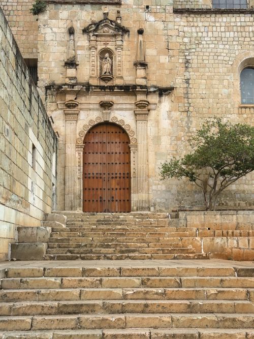 Free Stone-lined steps leading to a historic church entrance in Oaxaca, Mexico. Classic architecture and rich cultural heritage. Stock Photo