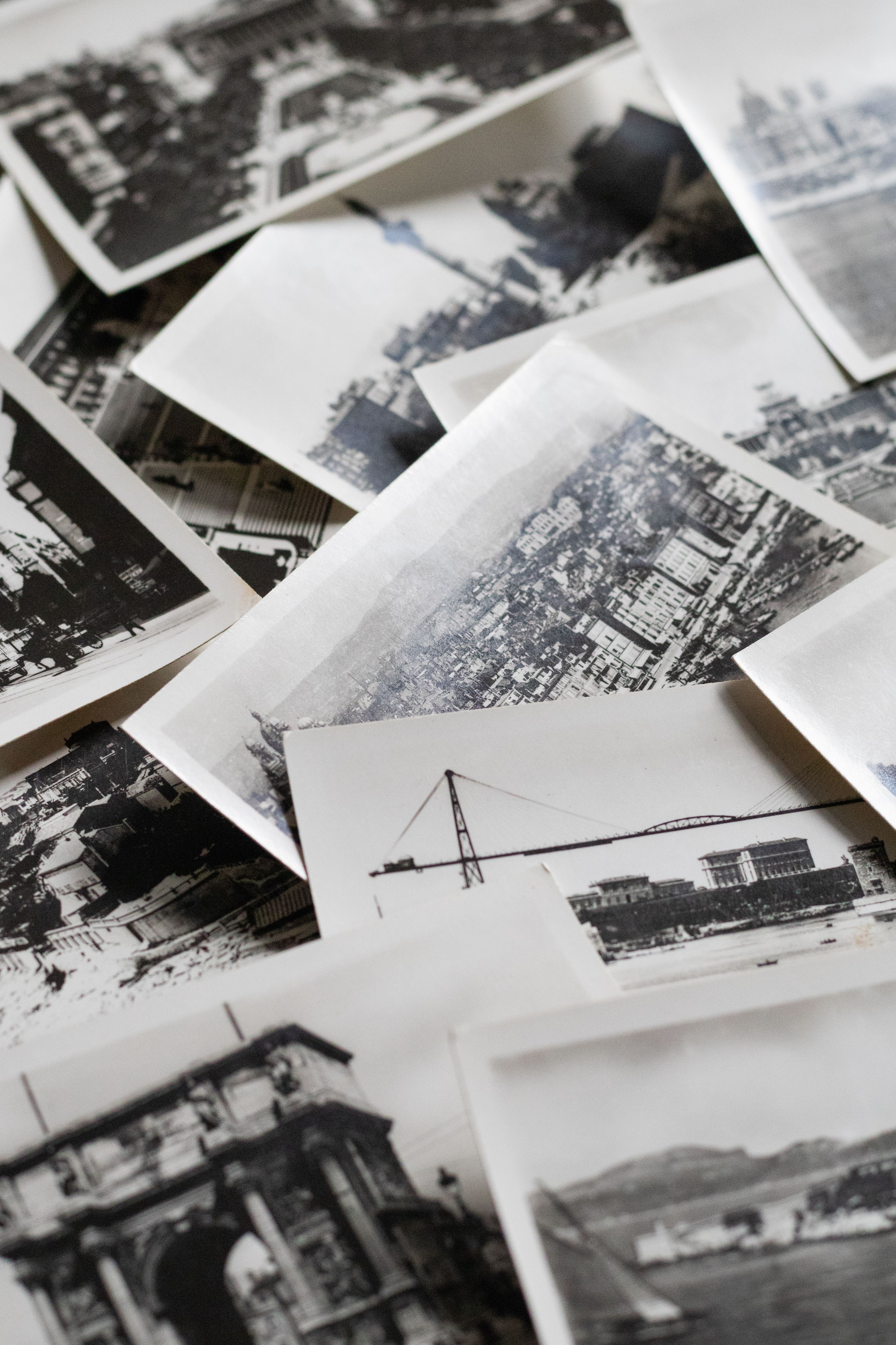 Collection of vintage black and white photos depicting various historical landmarks.