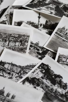 Collection of vintage black and white postcards featuring cityscapes, evoking nostalgia.