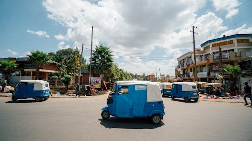 Free Photo of Blue Vehicles on Road Stock Photo