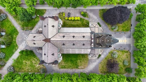 Free Stunning aerial shot of a historic church in Jönköping, surrounded by lush greenery. Stock Photo