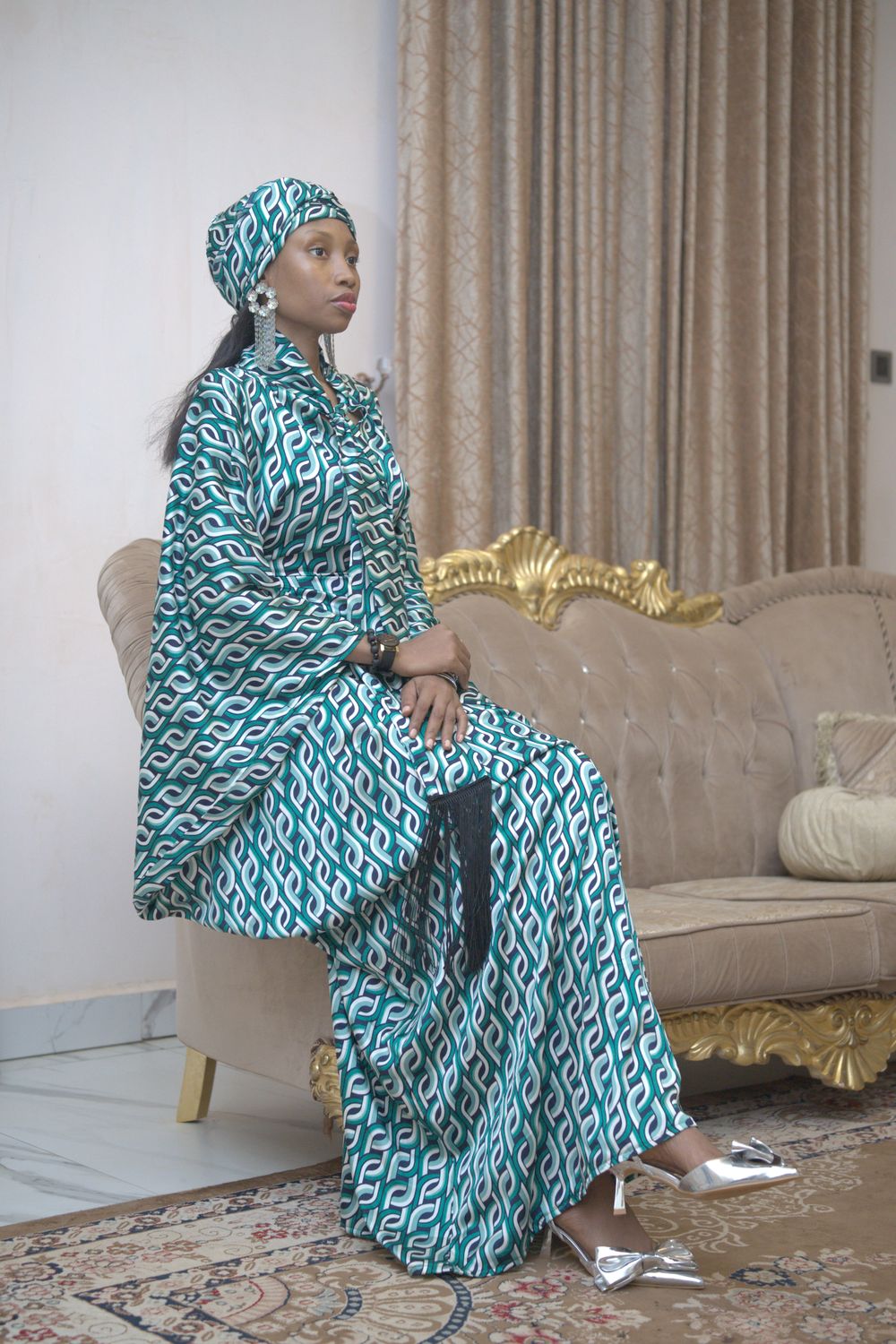 Elegant African Woman in Traditional Attire Indoors · Free Stock Photo