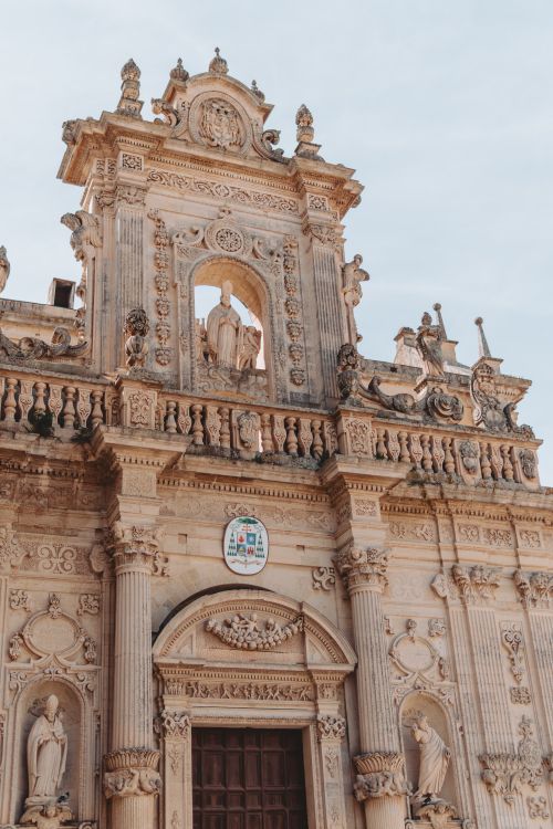 Free Explore the ornate Baroque details of Lecce's iconic architecture, epitomizing Italian elegance. Stock Photo