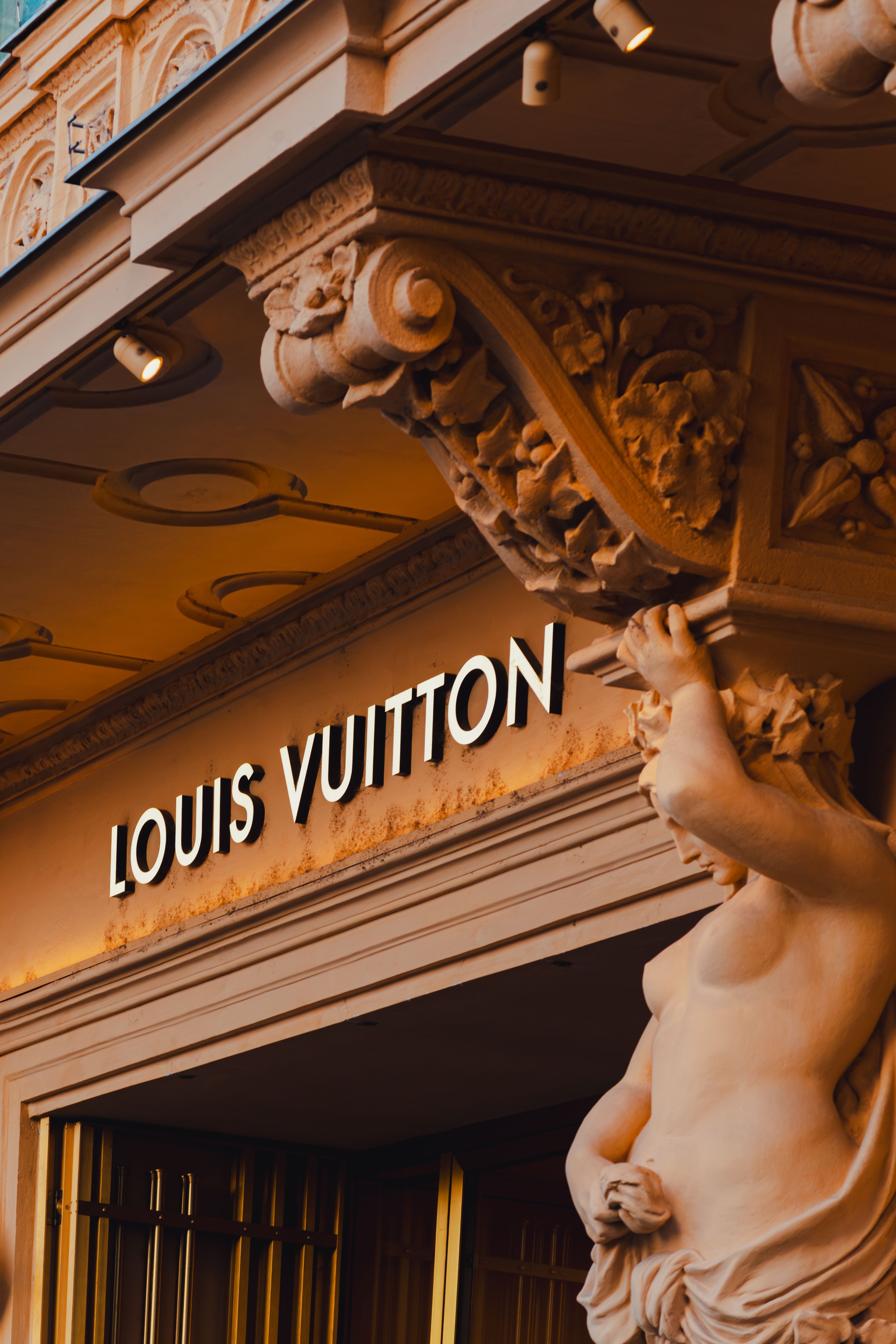 Detailed view of the Louis Vuitton store entrance in Vienna, showcasing intricate architecture.