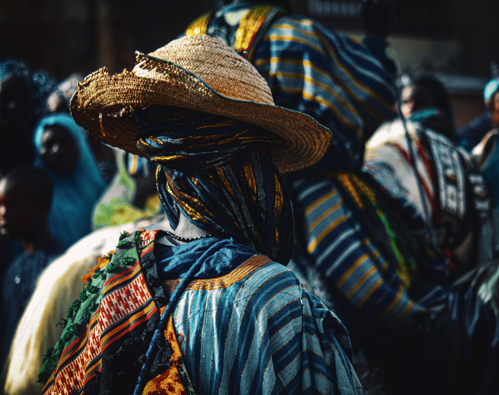 Vibrant traditional attire worn during a lively cultural festival in Kaduna, Nigeria.