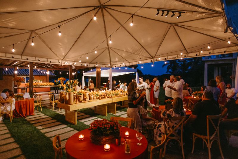 Family celebration under warm tent lighting