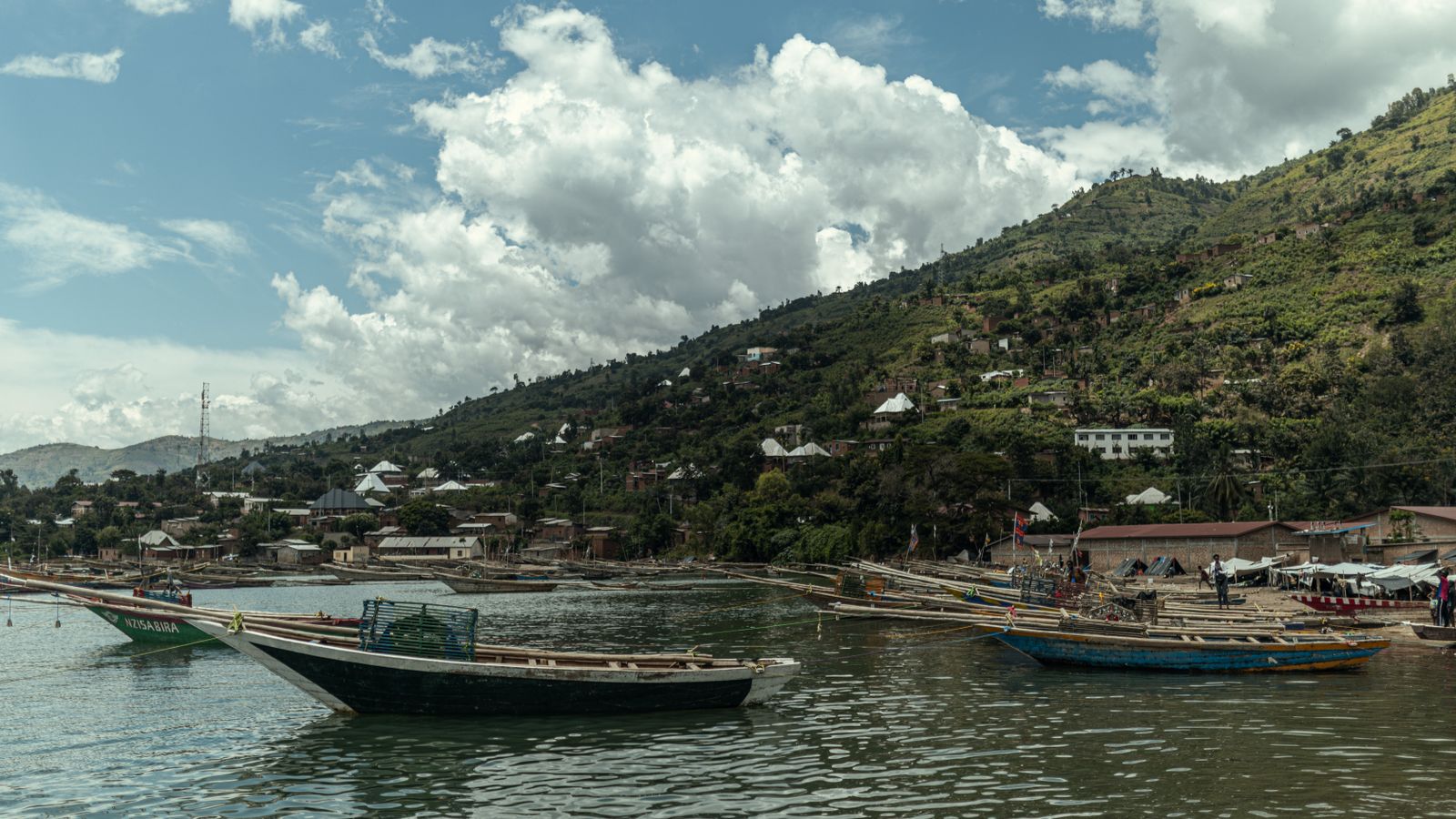 Tranquil lakeside village with fishing boats, Burundi
