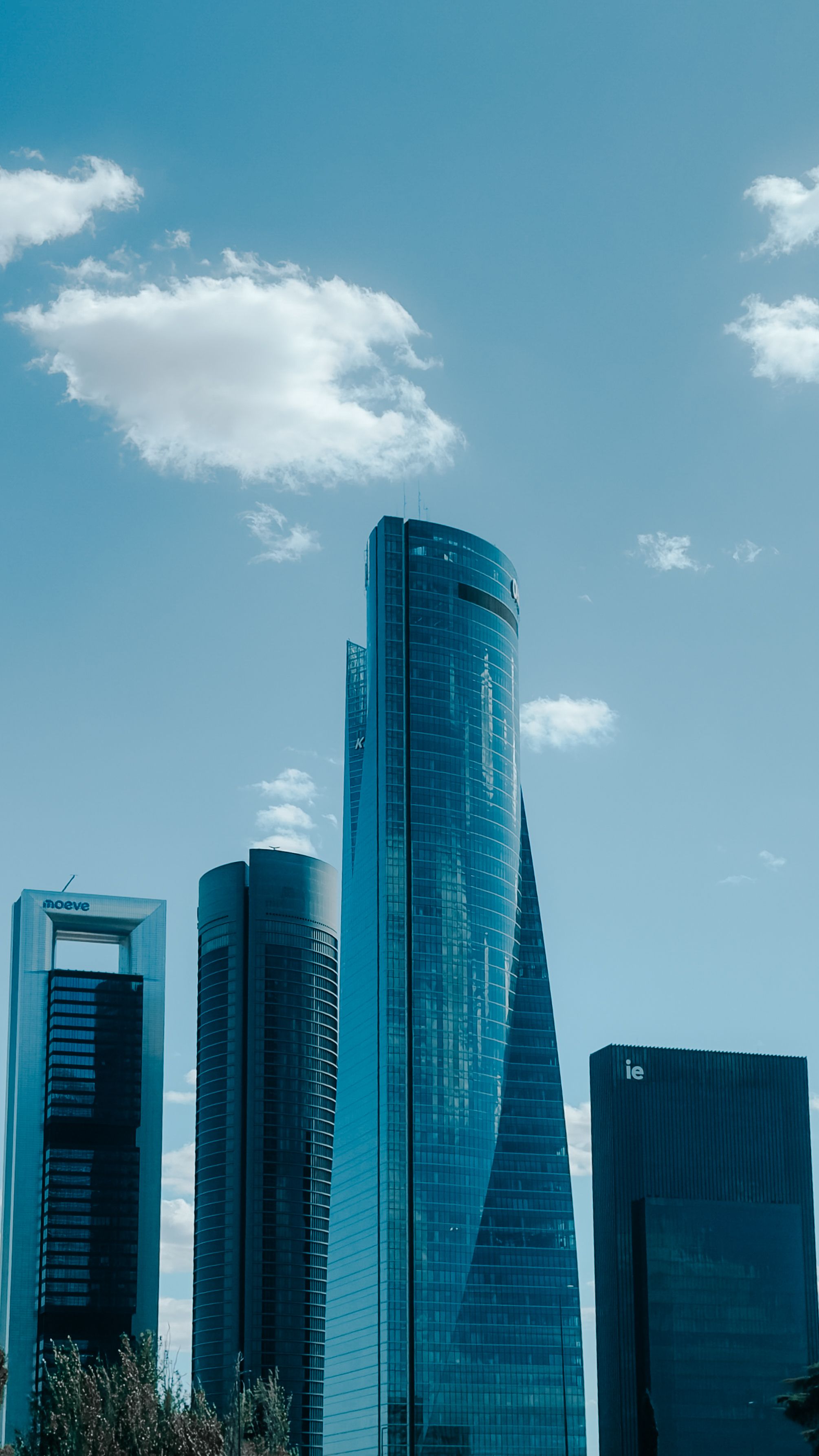 Stunning view of modern skyscrapers in Madrid's Cuatro Torres Business Area.