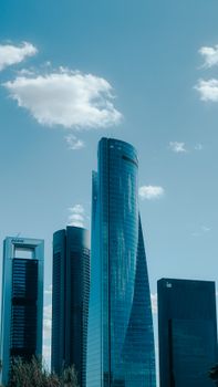 Stunning view of modern skyscrapers in Madrid's Cuatro Torres Business Area.