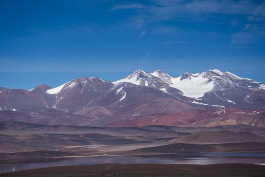 Stunning view of the Andes Mountains in Catamarca, Argentina under a clear blue sky.