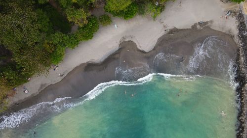 Free Stunning aerial shot of Playa Herradura showcasing turquoise waters and sandy beaches in Costa Rica. Stock Photo