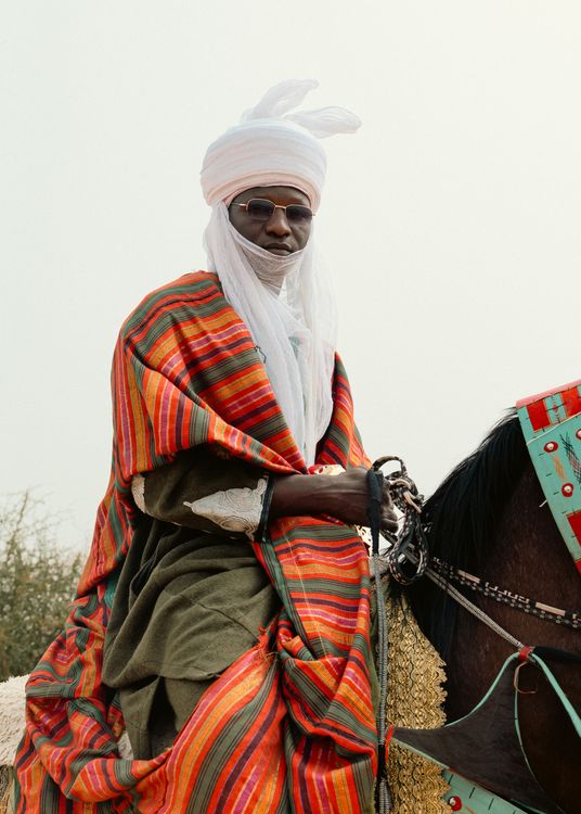 Regal Rider in Traditional African Attire · Free Stock Photo