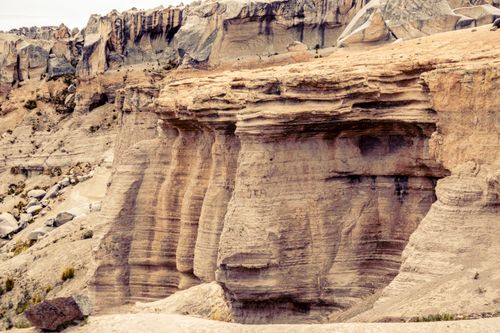 Free Beautiful eroded rock formations showcasing Peru's natural landscape in Arequipa, captured in warm hues. Stock Photo