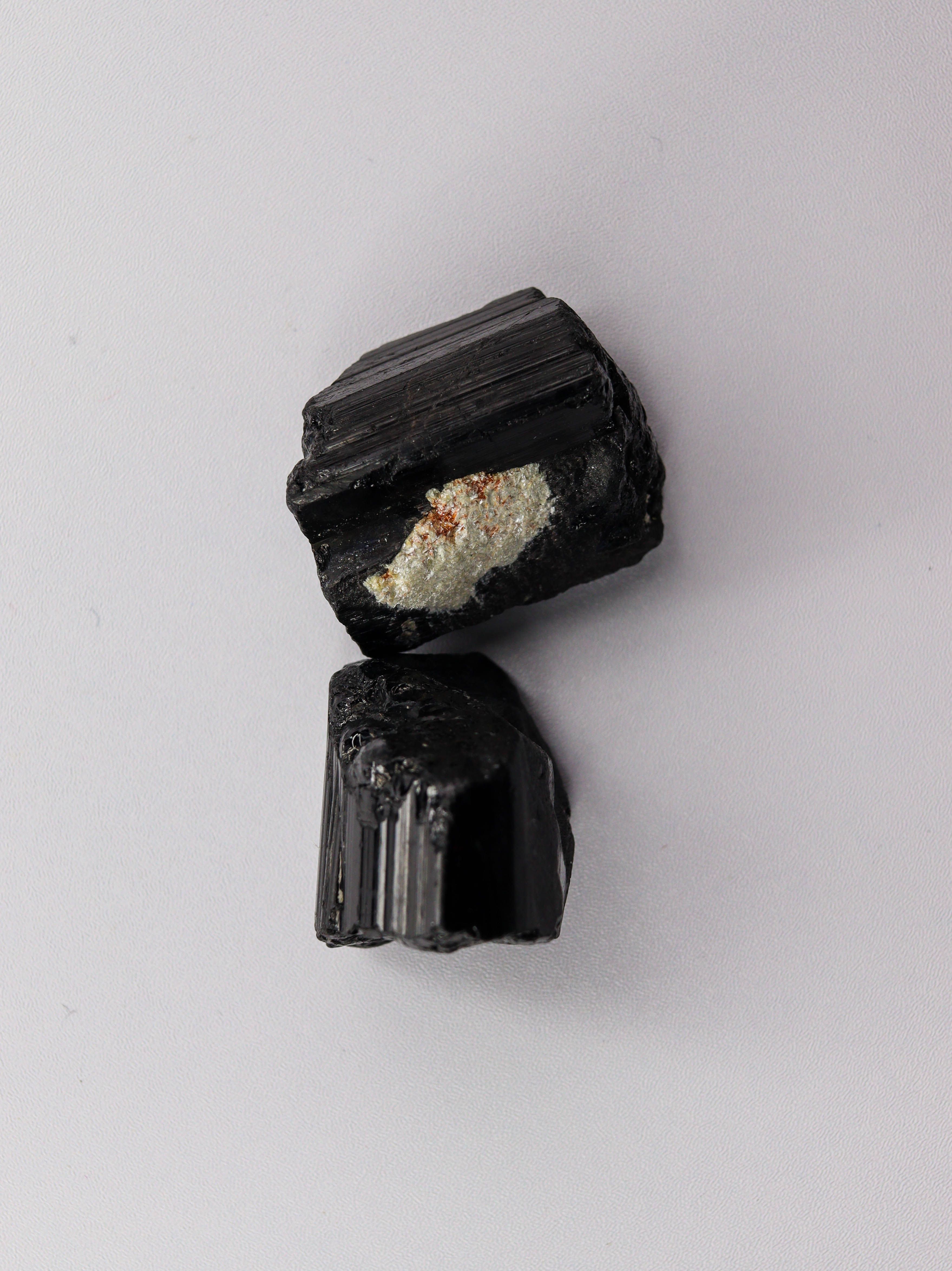Detailed image of black tourmaline crystals showcasing natural texture.