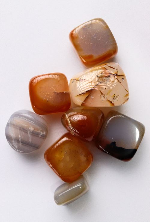 Free A selection of colorful polished agate stones on a white surface. Stock Photo