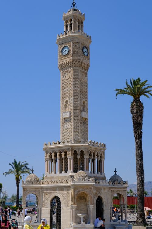 Free Iconic Izmir Clock Tower with palm trees at Konak Square, Turkey. Stock Photo