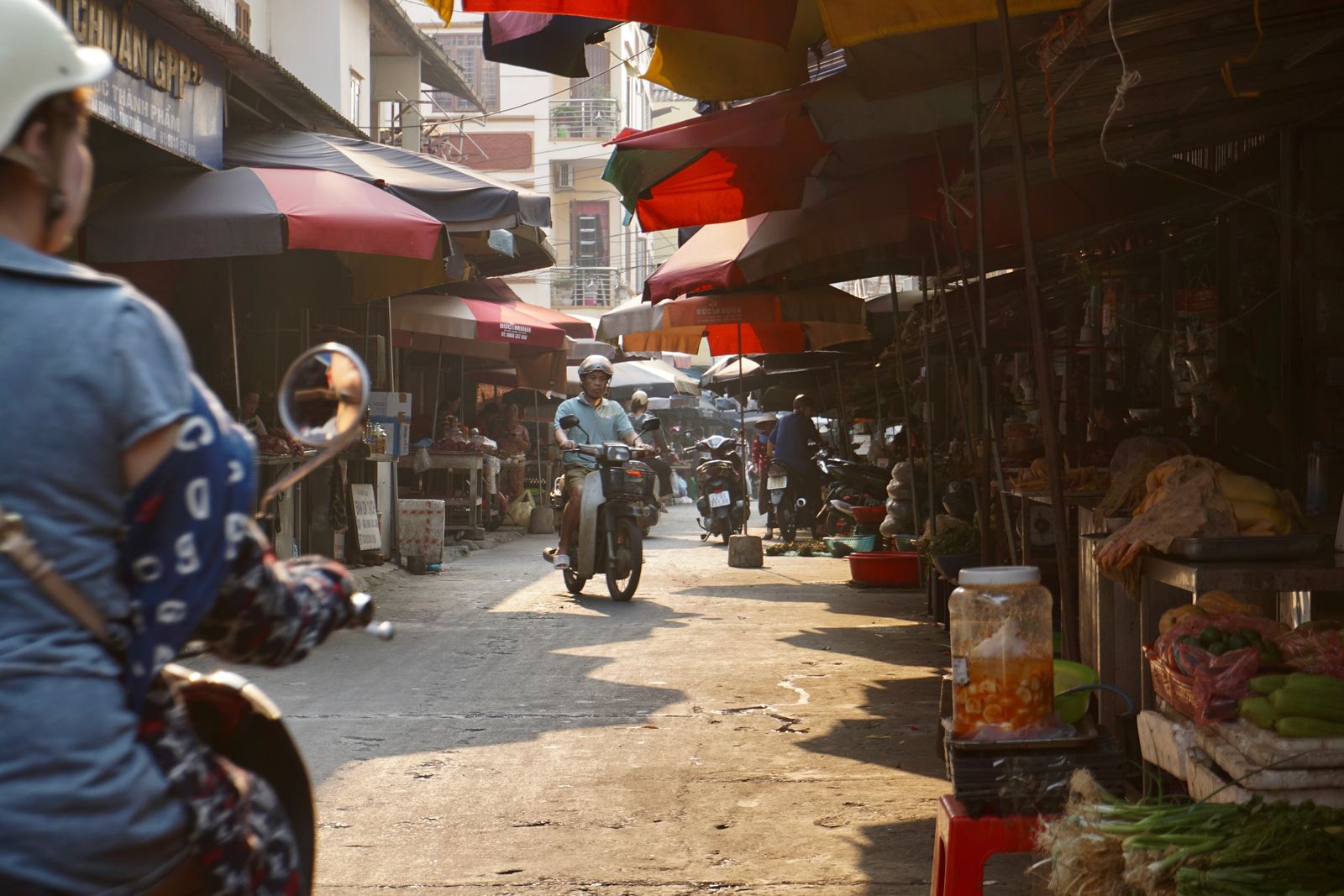 Local street market in Ha Giang Vietnam with motorbikes and daily life