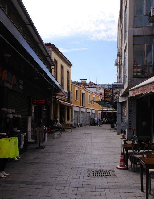 Free A vibrant pedestrian street in İzmir, Türkiye, showcasing local shops and architecture under a clear sky. Stock Photo