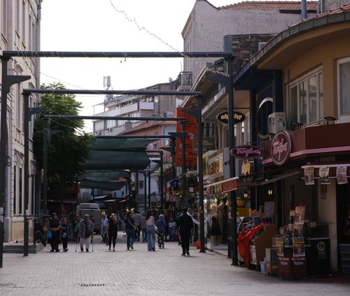 Free Crowded pedestrian street in İzmir, Türkiye, featuring shops and people during daytime. Stock Photo