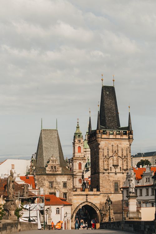 Free View of Charles Bridge and Gothic towers in Prague's old town. Stock Photo