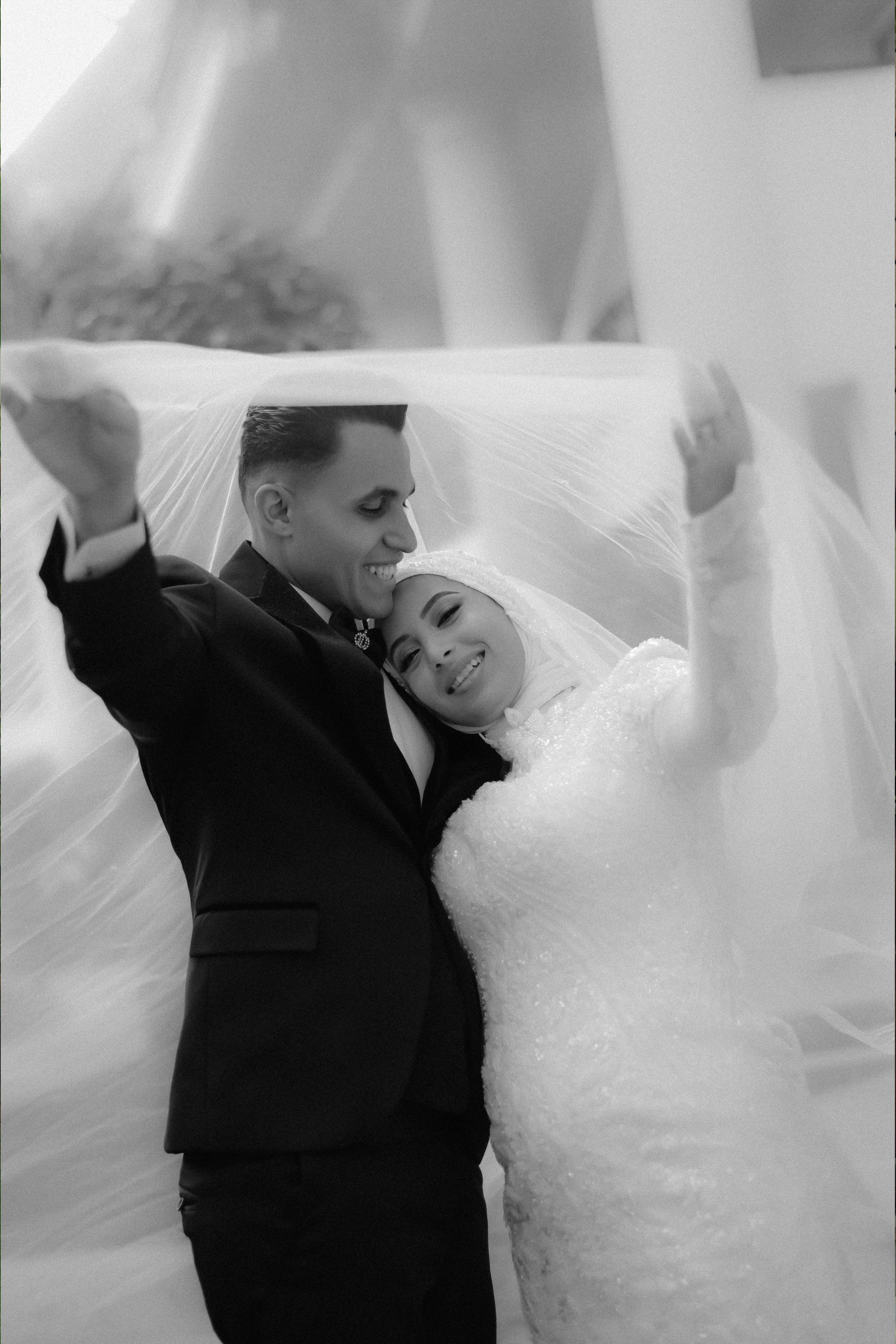 Elegant Wedding Day Joy Under Veil