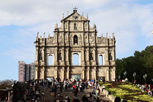 Free Vibrant crowd visits the ruins of St. Paul's, a renowned Macau landmark. Stock Photo